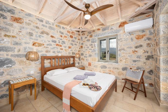 Double bedroom with A/C . - Villa Dioni Ena . (Photo Gallery) }}