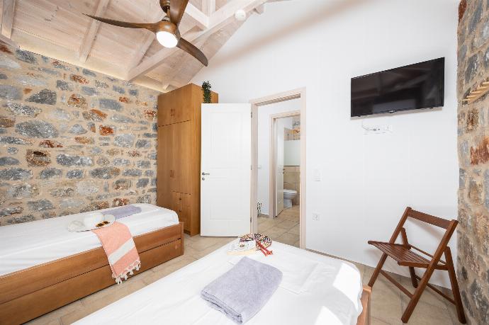 Twin bedroom with A/C . - Villa Dioni Ena . (Photo Gallery) }}