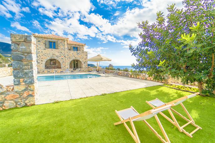 Outdoor area . - Villa Dioni Tria . (Photo Gallery) }}