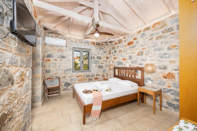 Double bedroom with A/C . - Villa Dioni Tria . (Photo Gallery) }}