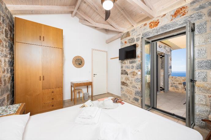 Double bedroom with A/C . - Villa Dioni Tria . (Photo Gallery) }}