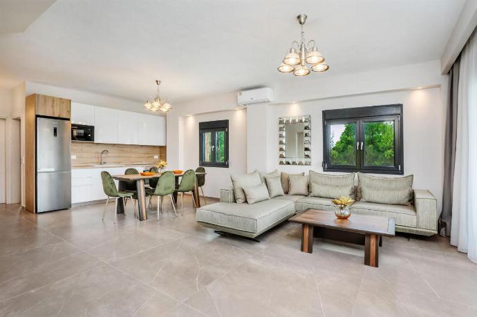 Open plan living room and kitchen . - Epta Villas Thio . (Photo Gallery) }}