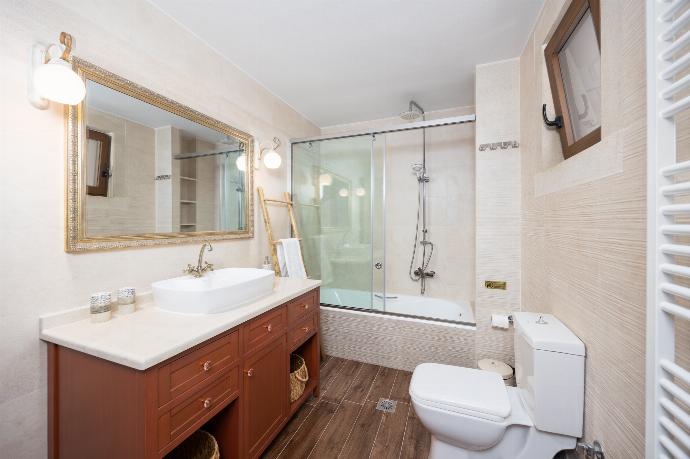 Family bathroom with bath and shower . - Villa Koupos . (Photo Gallery) }}