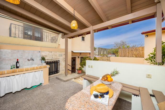 Sheltered terrace area . - Villa Koupos . (Photo Gallery) }}