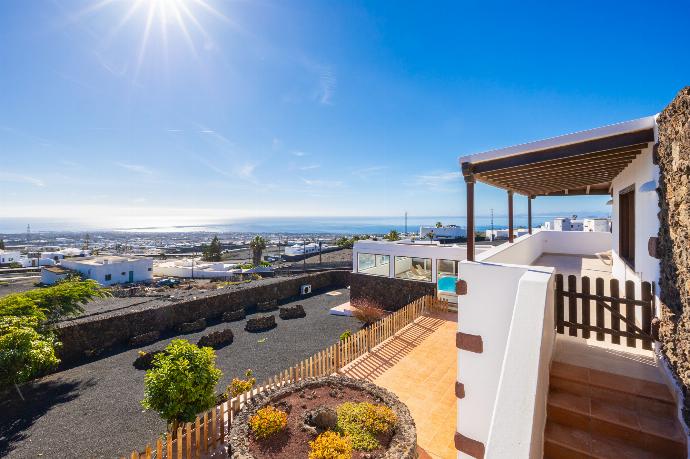Terrace area with sea views . - Villa Asomada . (Photo Gallery) }}
