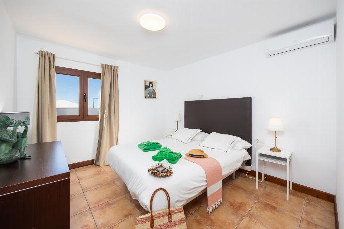 Double bedroom with A/C . - Villa Asomada . (Photo Gallery) }}