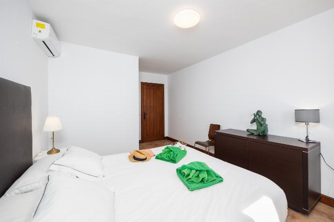Double bedroom with A/C . - Villa Asomada . (Photo Gallery) }}