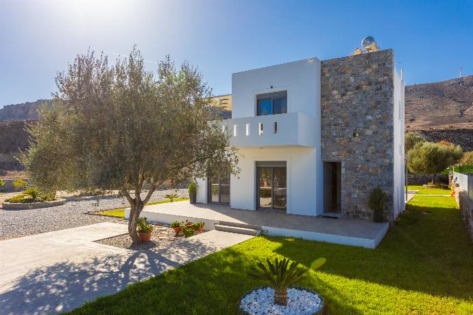 Open-plan living room with sofa, dining area, kitchen, A/C, WiFi internet, and satellite TV . - Villa Livis 1 . (Photo Gallery) }}