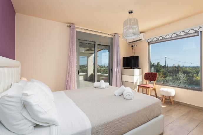 Double bedroom with A/C . - Villa Ammos . (Photo Gallery) }}