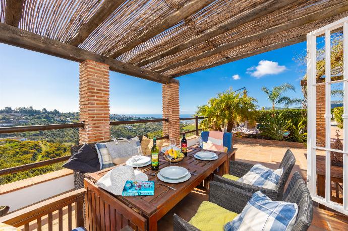 Sheltered terrace area with sea views . - Villa Los Espejos De Frigiliana . (Photo Gallery) }}