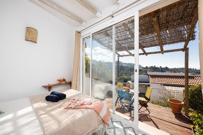 Double bedroom in annex with A/C . - Villa Los Espejos De Frigiliana . (Photo Gallery) }}