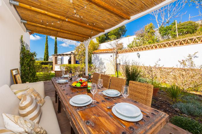 Sheltered terrace area . - Villa Los Espejos De Frigiliana . (Photo Gallery) }}