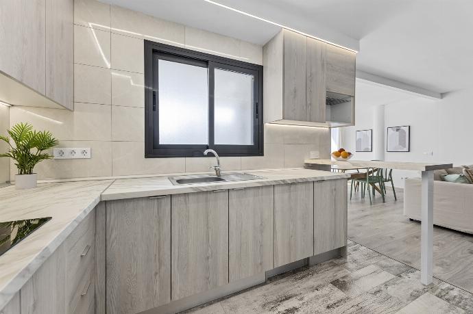 Equipped kitchen . - Villa Oscar . (Photo Gallery) }}