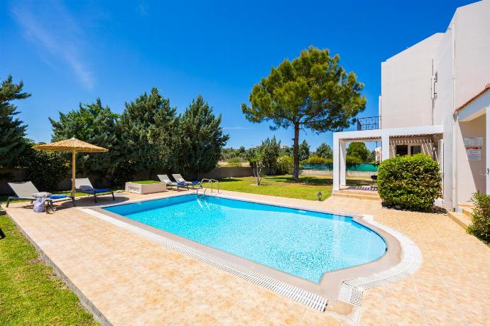 Private pool, terrace, and garden . - Villa Afrodite Classico . (Photo Gallery) }}