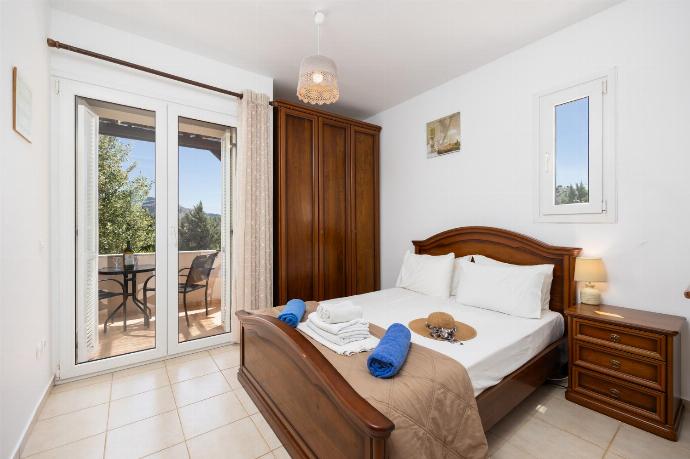 Double bedroom with A/C . - Villa Afrodite Classico . (Photo Gallery) }}