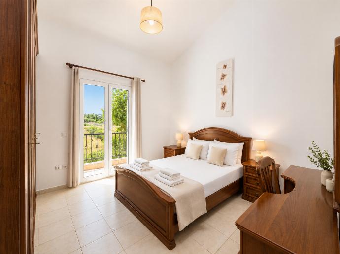 Double bedroom with A/C . - Villa Afrodite Classico . (Photo Gallery) }}