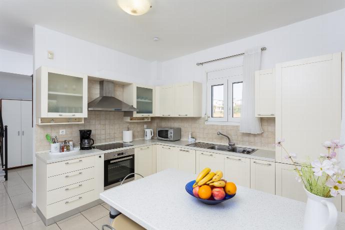 Equipped kitchen . - Amphitrite Villa . (Photo Gallery) }}