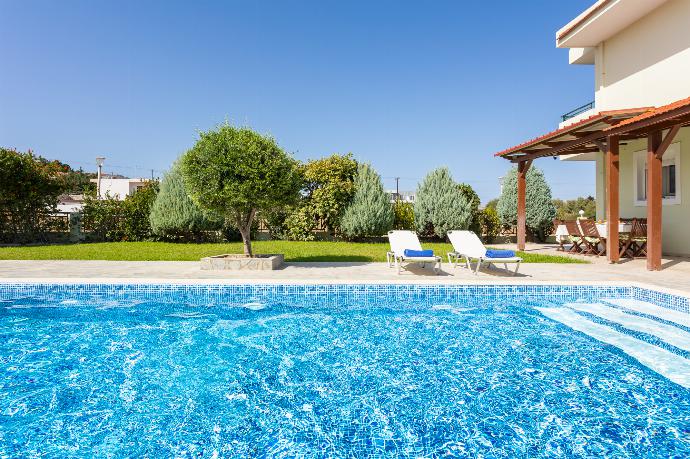 Private pool, terrace, and garden . - Hermione Villa . (Photo Gallery) }}