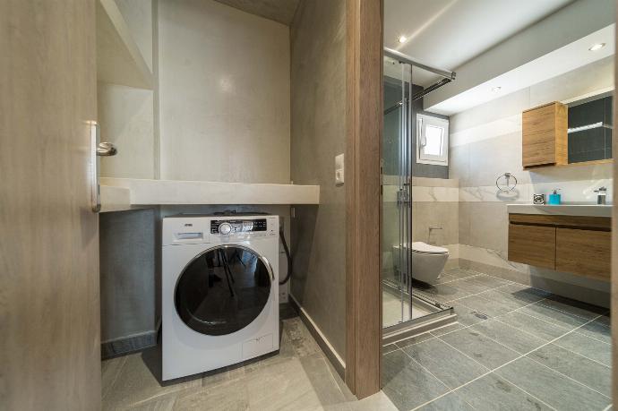 Family bathroom with shower and washing machine . - Villa Rudi . (Photo Gallery) }}