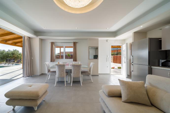 Open-plan living room with sofa, dining area, kitchen, WiFi internet, satellite TV . - Villa Rudi . (Photo Gallery) }}