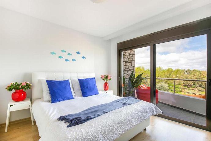 Double bedroom with A/C and terrace access . - Villa Ira . (Photo Gallery) }}