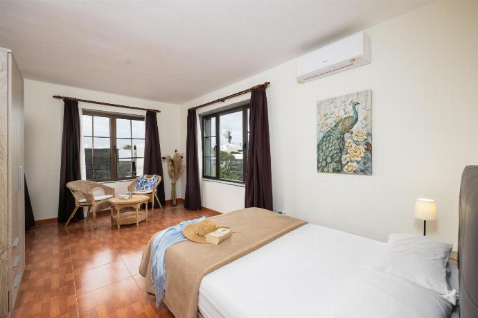 Double bedroom with A/C . - Villa Capricho . (Photo Gallery) }}