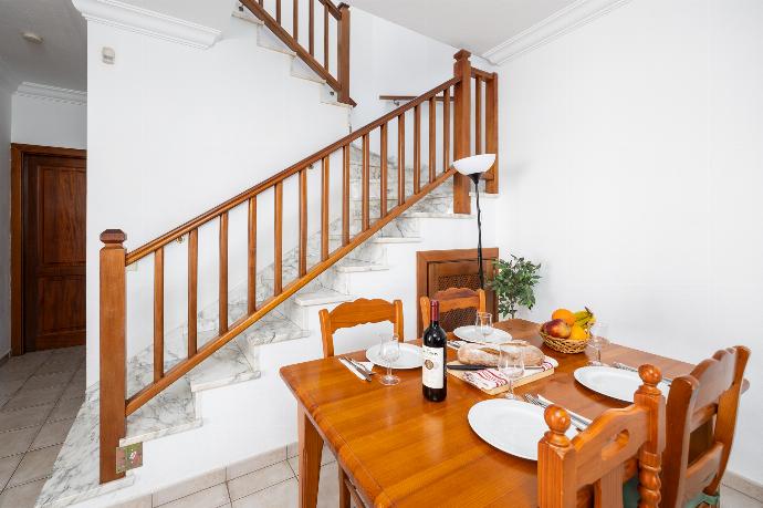 Living room with sofa, dining area, A/C, WiFi internet, and satellite TV . - Villa Florencia . (Photo Gallery) }}