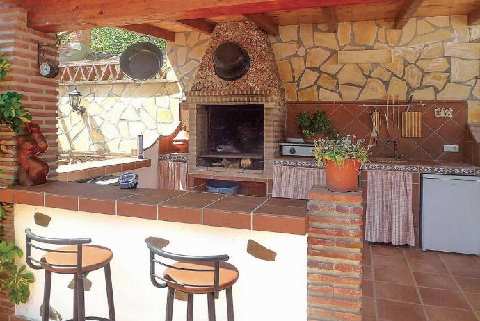 Outdoor area with BBQ . - Villa Daniel . (Photo Gallery) }}