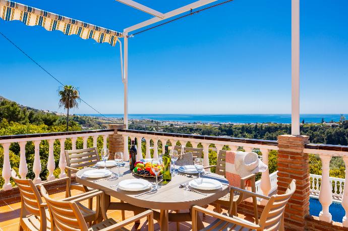 Terrace area with sea views . - Villa Medina Paloma . (Photo Gallery) }}