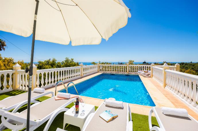 Private pool and terrace with sea views . - Villa Medina Paloma . (Photo Gallery) }}
