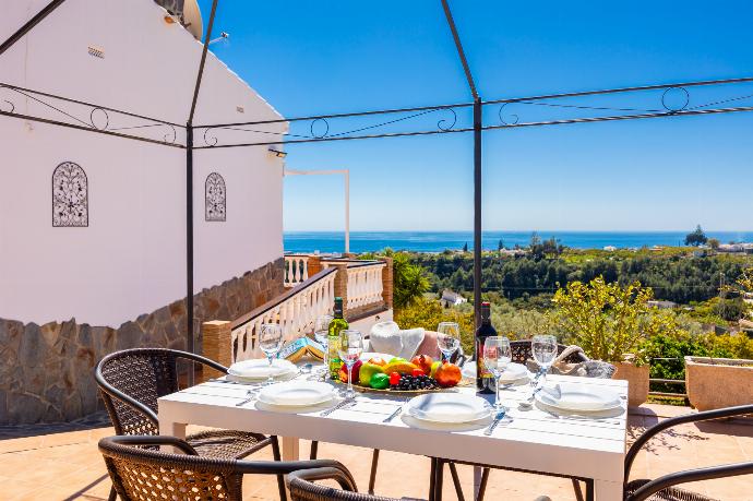 Terrace area with sea views . - Villa Medina Paloma . (Photo Gallery) }}