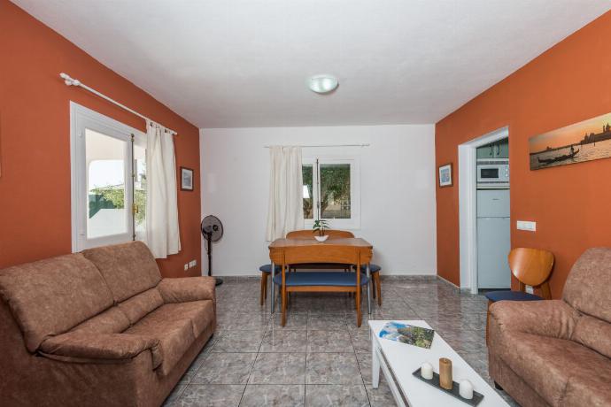 Open plan living room with comfortable sofas, TV, WiFi and dining area . - Villa Patri . (Photo Gallery) }}