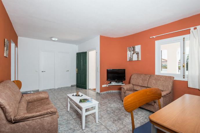 ,Open plan living room with comfortable sofas, TV, WiFi and dining area . - Villa Patri . (Photo Gallery) }}