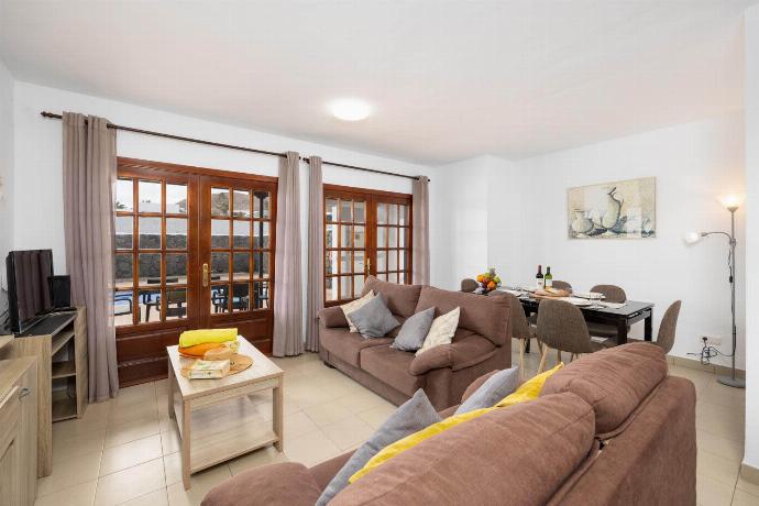 Living room with sofas, dining area, WiFi internet, and satellite TV . - Villa Salar . (Photo Gallery) }}