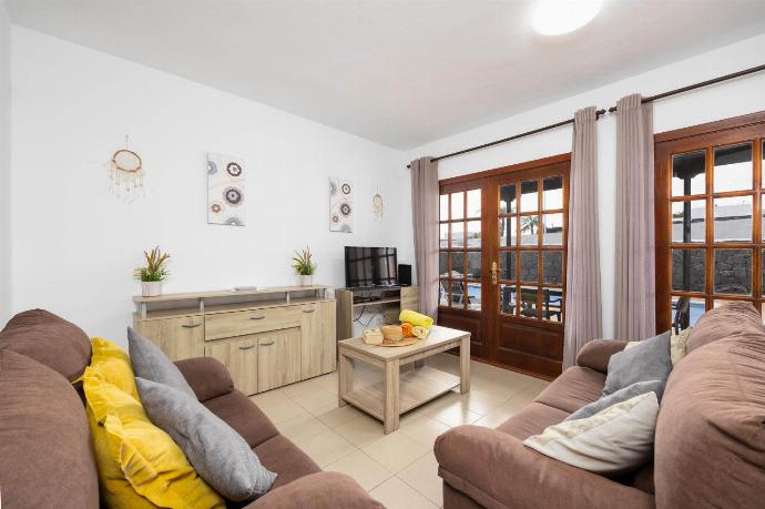 Living room with sofas, dining area, WiFi internet, and satellite TV . - Villa Salar . (Photo Gallery) }}