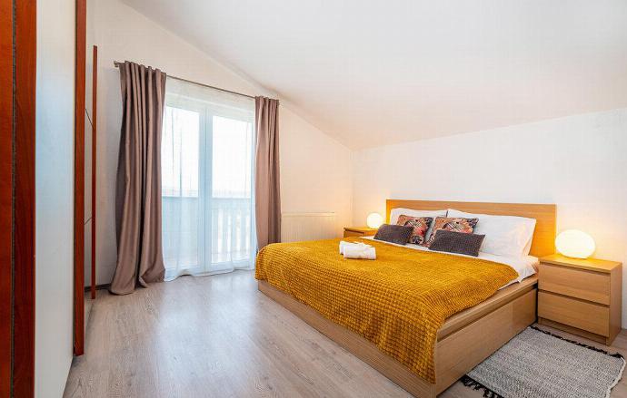 Double bedroom with A/C  and upper terrace access . - Villa Maslina . (Photo Gallery) }}