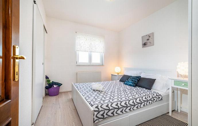 Double bedroom with A/C and ensuite bathroom . - Villa Maslina . (Photo Gallery) }}