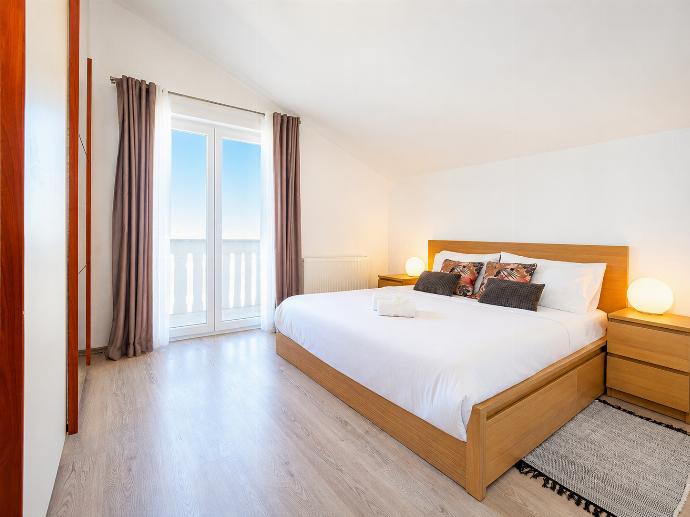 Double bedroom with A/C  and upper terrace access . - Villa Maslina . (Photo Gallery) }}