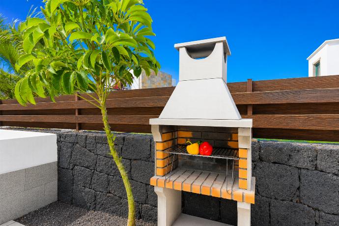 BBQ area . - Villa Isadora . (Galerie de photos) }}