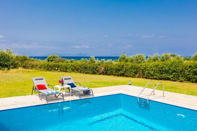 Private pool, terrace, and garden with sea views . - Villa Sunset . (Photo Gallery) }}