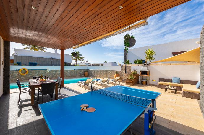 Sheltered terrace area with table tennis . - Villa Sal Marina . (Photo Gallery) }}