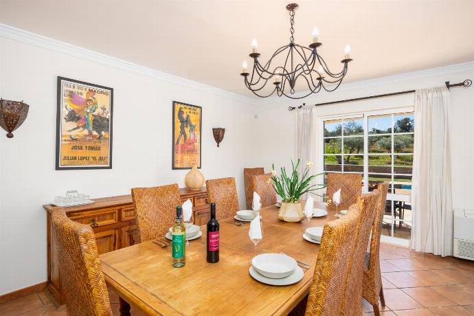 Living room with sofas, dining area, ornamental fireplace, WiFi internet, and satellite TV . - Quinta Monte dos Avos . (Photo Gallery) }}