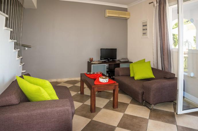 Open plan living room with TV, A/C, WiFi, patio doors . - Villa Naisy . (Photo Gallery) }}