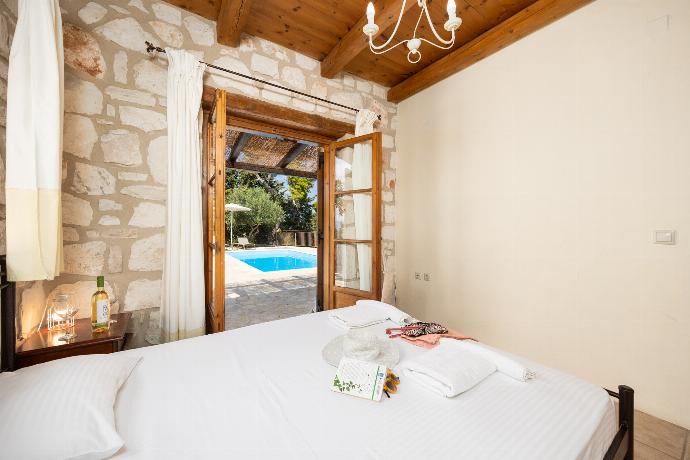 Double bedroom with A/C . - Villa Aloni . (Photo Gallery) }}