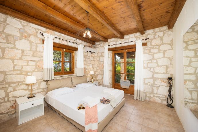 Double bedroom with A/C . - Villa Aloni . (Photo Gallery) }}