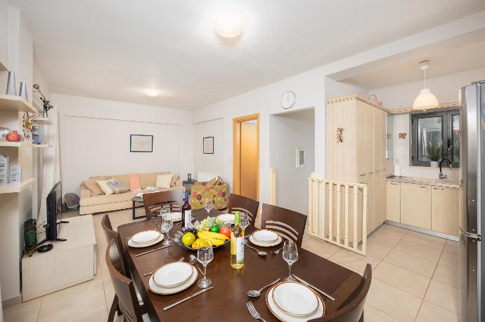 Open-plan living room with sofa, dining area, kitchen, A/C, WiFi internet, and satellite TV . - Villa Nora . (Photo Gallery) }}