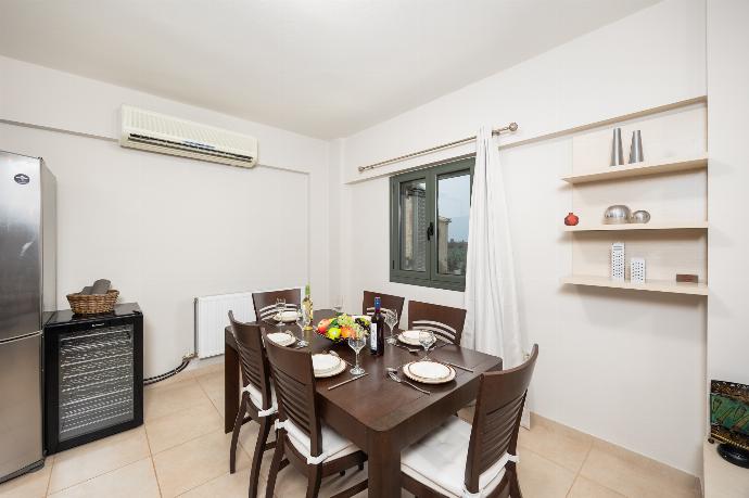 Open-plan living room with sofa, dining area, kitchen, A/C, WiFi internet, and satellite TV . - Villa Nora . (Photo Gallery) }}