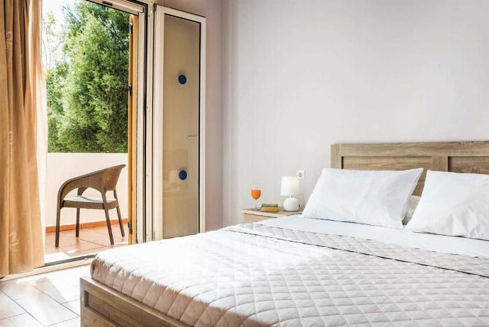 Double bedroom with terrace access . - Villa Alex . (Photo Gallery) }}