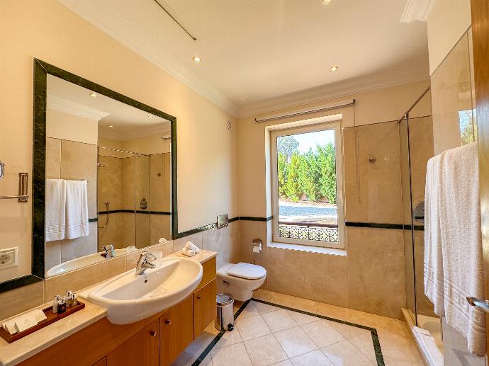En suite bathroom with shower . - Villa Monte Rei . (Photo Gallery) }}