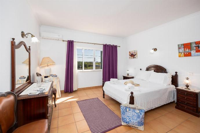 Double bedroom with en suite bathroom and A/C . - Villa Sol Nascente . (Photo Gallery) }}